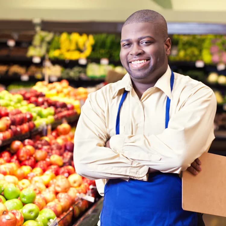 A store employee at Adepa African Grocery